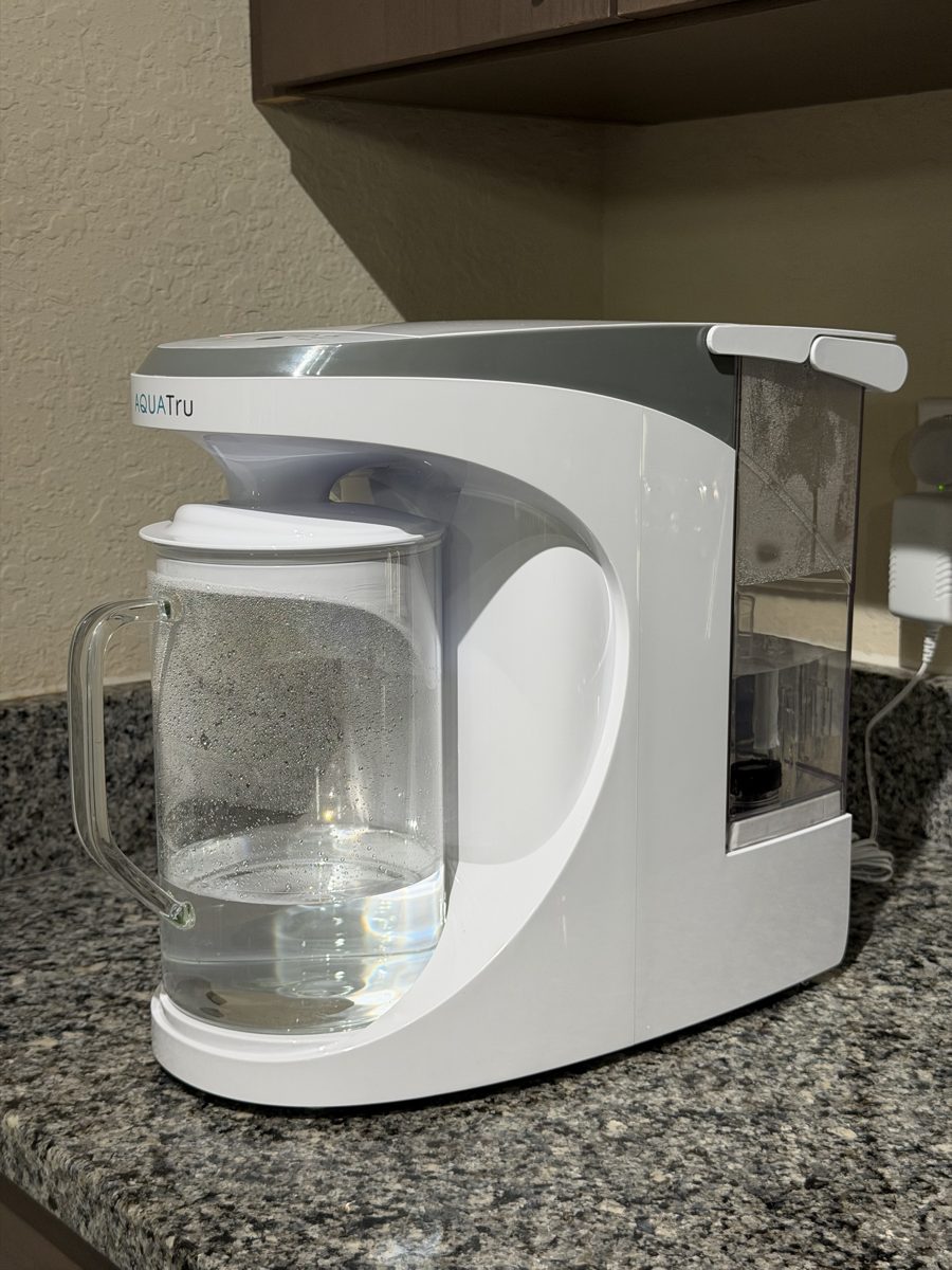 Gloria's AquaTru countertop reverse osmosis water system on her kitchen counter